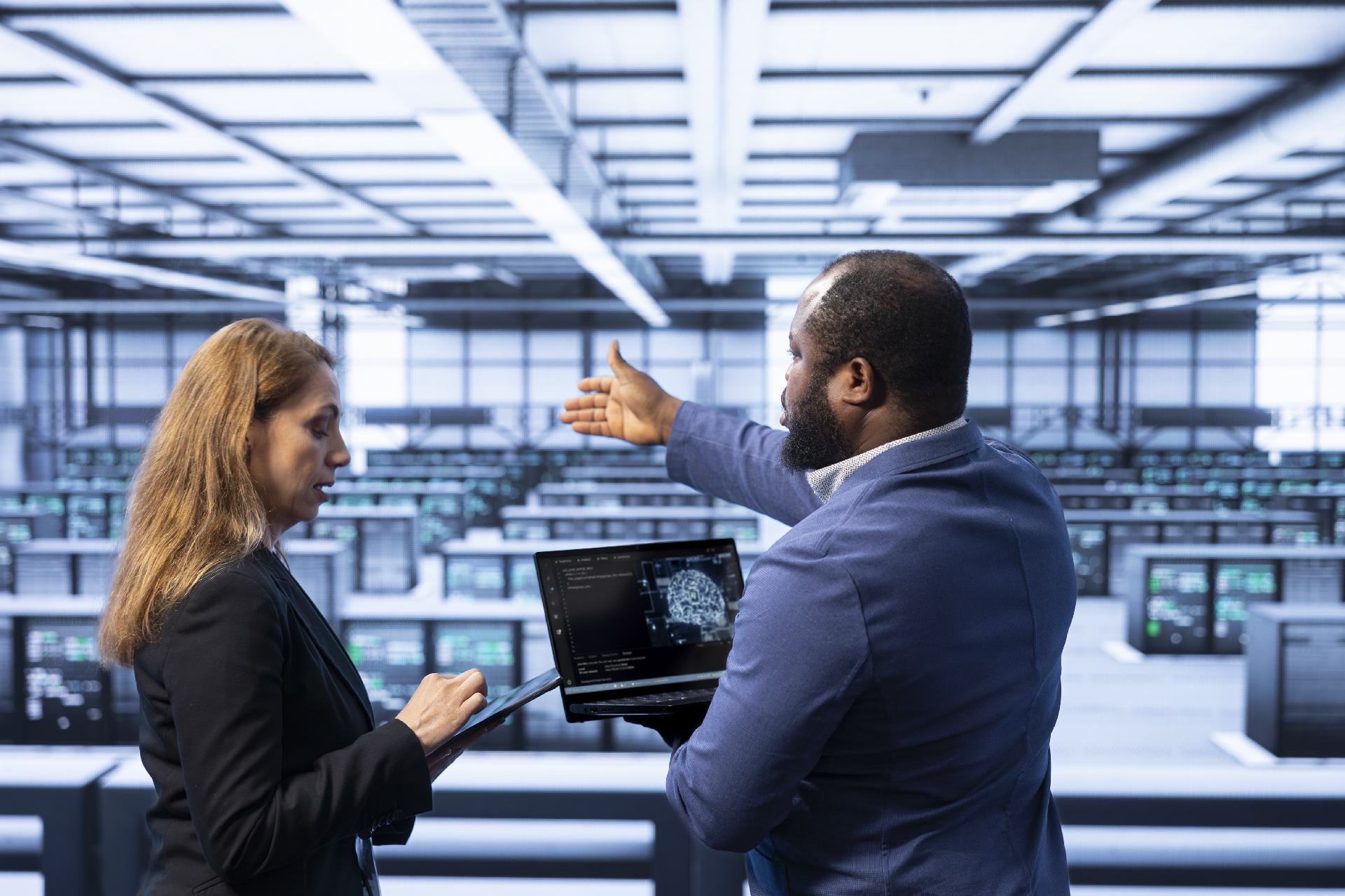 Two engineers reviewing a small AI-assisted pull request inside the team's own pipeline